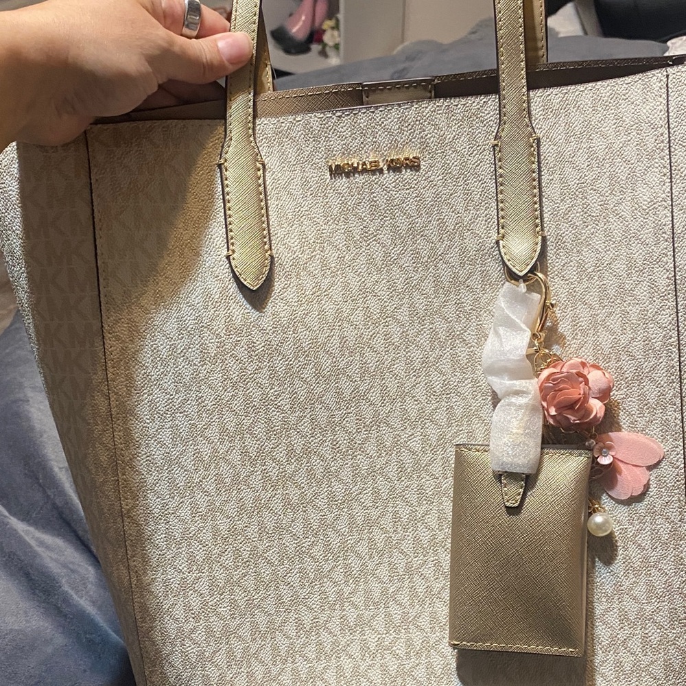 Michael Kors Gold and white Tote with Floral Charm